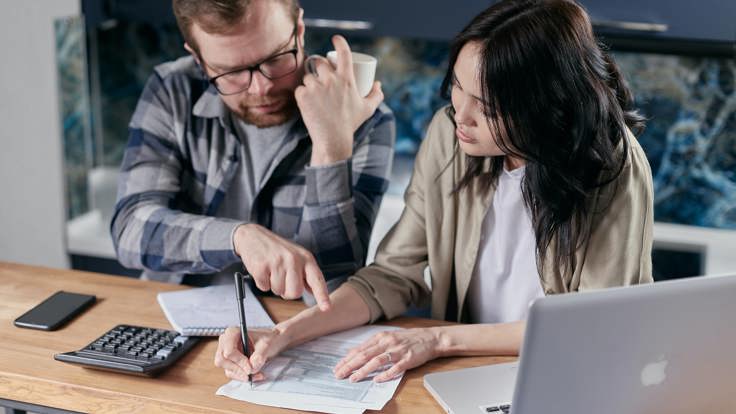 Couple looking at their finances